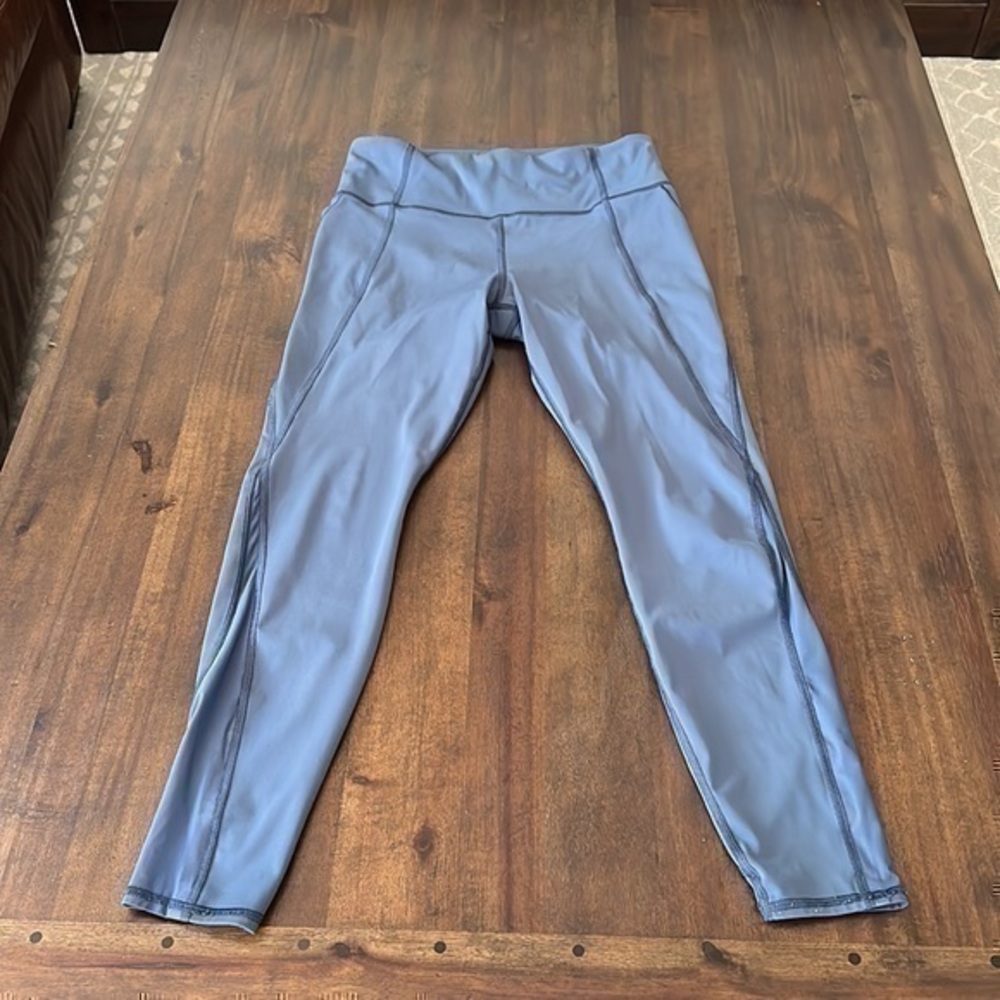 Athleta lightning tight iron blue color, size medium